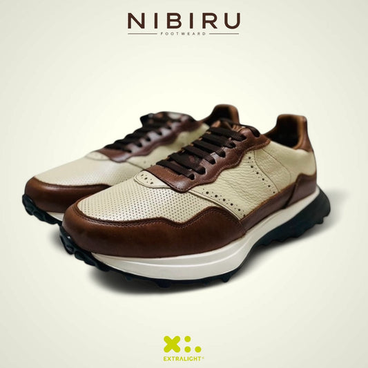 sneaker de piel coñac crema bostoniano detalle grabado punto suela extralight 20k10